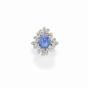  - Anello in oro bianco 18k, zaffiro e diamanti