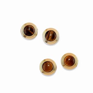  - Four 18K yellow gold and tiger's eye buttons