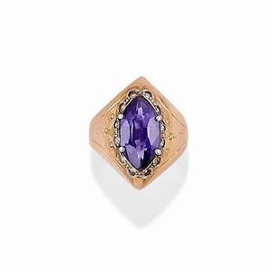  - A 18K two-color gold, amethyst and synthetic diamond ring, circa 1950