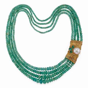 A 18K yellow gold, emerald and mother-of-pearl necklace