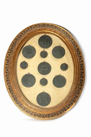  - Eleven circular plaques in composite material, 19th - 20th centuries
