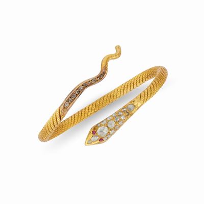 Bracciale a serpente in oro giallo 18K con diamanti e rubini