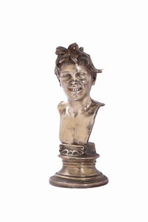  - Silver sculpture depicting a young boy, 20th century