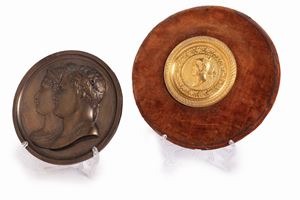  - Lot of two round bas-reliefs, 19th century