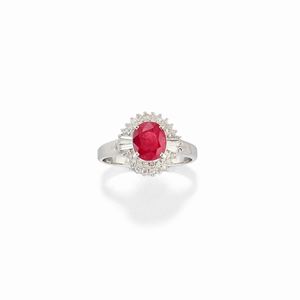 A platinum, ruby and diamond ring