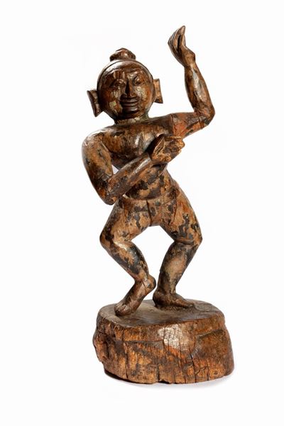 Scultura in legno raffigurante Krishna bambino, India, secolo XIX, altezza cm 50