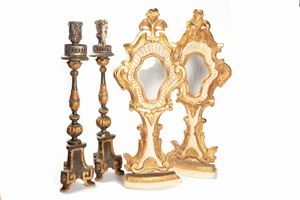  - Lot consisting of a pair of relic holder and a pair of candle holders, in lacquered and gilded wood, 18th century