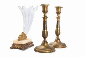  - Lot consisting of a crystal and gilt bronze vase in the cornucopia shape and a pair of bronze candles holder, 19th century