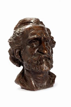  - A bronze sculpture depicting the portrait of Giuseppe Verdi, with a dark patina, 20th century