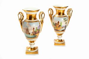 - A pair of Empire vases in polychrome and gilded porcelain, late 19th century
