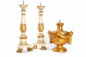  - Lot consisting of a pair of candles holders and a single candles holder in lacquered and gilded wood, late 18th century