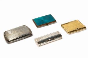 Lot consisting of two small boxes and two cigarette holders, 20th century