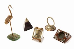 Lotto composto da cinque porta orologi, secoli XIX - XX