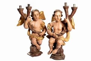 Pair of lacquered and gilded wood candle-holder angels, 17th century