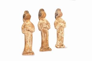Three ancient terracotta figures of Fat Lady with traces of polychrome, China