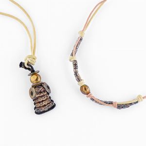 Lotto di due collane in argento, dodo di pomellato