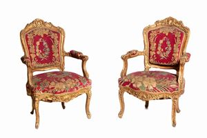  - Pair of carved and gilded wood armchairs, 18th century