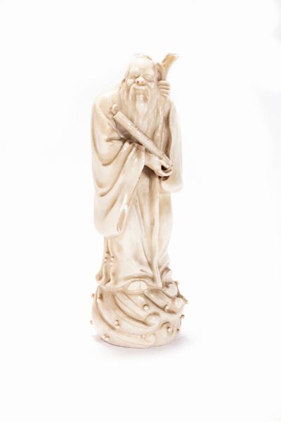 Scultura in blanc de Chine raffigurante un saggio, Cina, fine XIX - inizio XX secolo