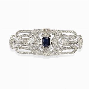 Spilla in platino, oro, zaffiro e diamanti