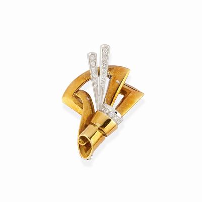 Spilla in oro bicolore 18k decorata con diamanti taglio brillante