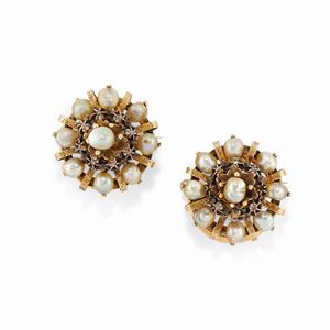 A couple of silver, 18k yellow gold, diamond and pearl earclips-brooches