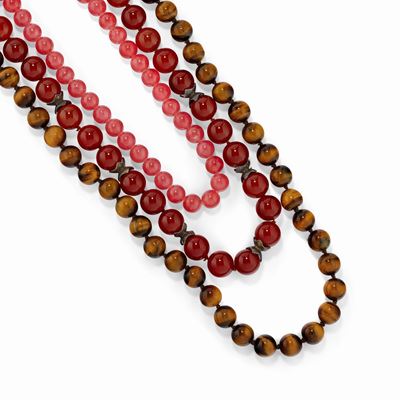 Tre collane in argento e oro giallo 18k con occhio di tigre e pietre colorate