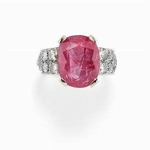 A platinum, burma ruby and diamond ring
