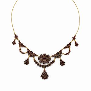 Collana in metallo dorato e oro giallo 10K con granati