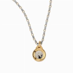 Collana con pendente in oro 18k e acciaio