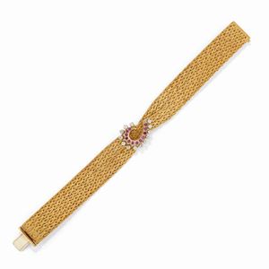 A 18K yellow gold, diamond and ruby bracelet 