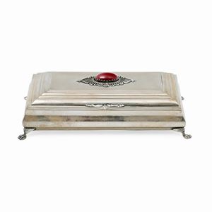  - A silver, red cabochon stone jewel case 