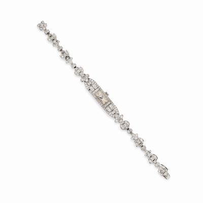 Orologio in platino decorato con diamanti taglio huit-huit