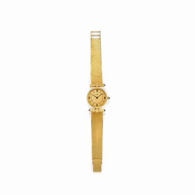 Orologio da donna in oro giallo 18k con quadrante giallo e zaffiri