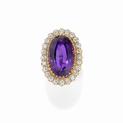 Anello in oro bicolore 18K con ametista ovale e diamanti