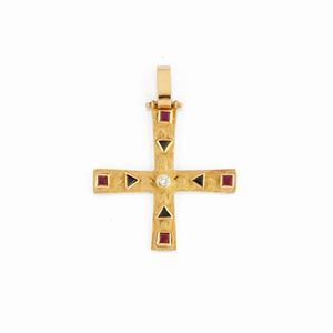 A 18K yellow gold, diamond, sapphire and ruby pendant 