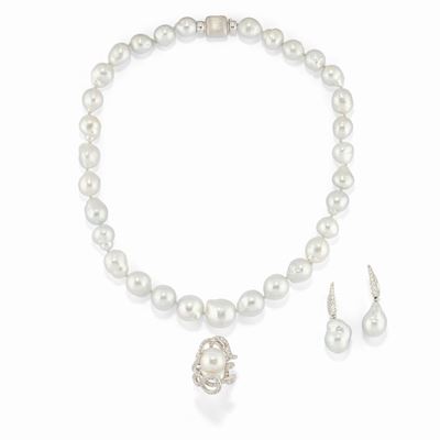 Parure in oro bianco 18K con diamanti taglio brillante e perle scaramazze