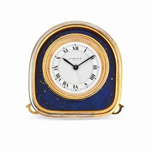 A gilded gold, blue enamel and white dial table watch, Cartier, with warranty and box, defects