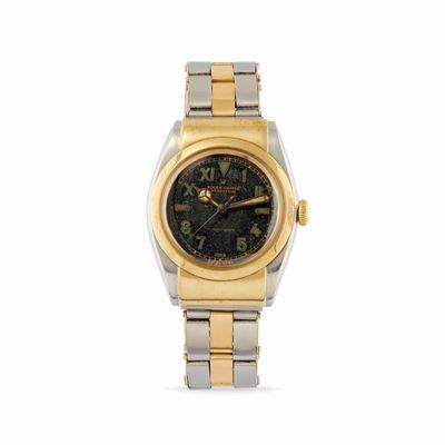Ovetto 3065, Cassa tonneau in acciaio e oro 18k con quadrante California