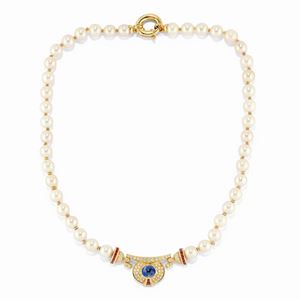 A cultured pearl, 18K yellow gold, diamond, saphire and ruby necklace