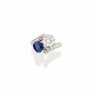 A 18k white gold, diamond and sapphire ring, with certificate