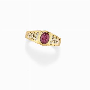 Anello in oro 18k, rubino e diamanti, 1980 circa
