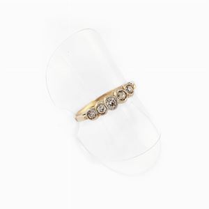 Anello in oro 18k e pietre incolori