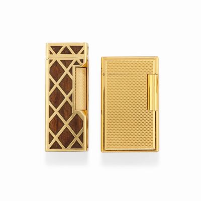 Accendini in metallo dorato e oro giallo 18k, con decorazioni e astucci