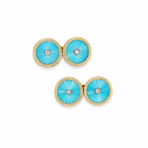 A 14K yellow gold, diamond and enamel cufflinks 
