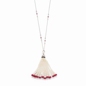 A 18K white gold, pearl, diamond, ruby and onyx necklace 