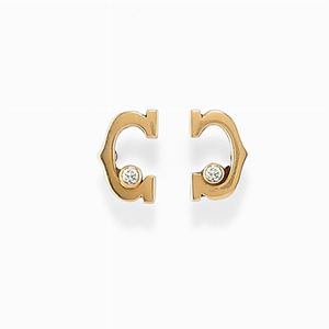 A 18K pink gold and diamond earrings, Cartier