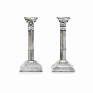  - A couple of sterling candlesticks, London 20th Century