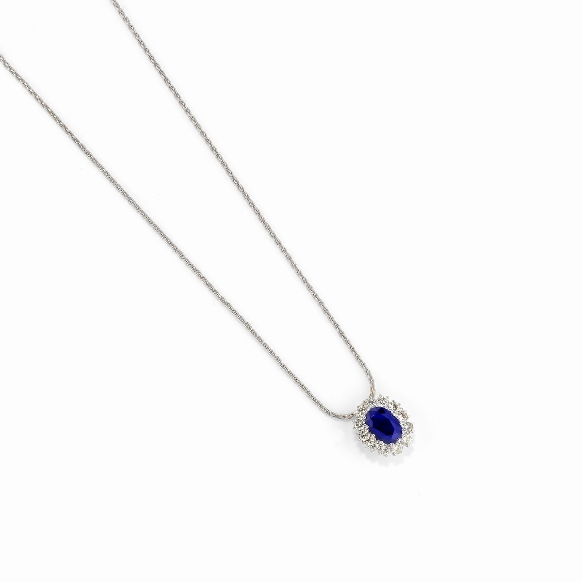 Collane in oro bianco 18K con diamanti, smeraldo e zaffiro