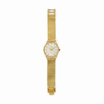 Orologio in oro giallo 18k, cassa rotonda con movimento a carica manuale