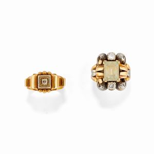 Two silver, 18k yellow gold, uncolored gemstone and diamond rings, circa 1940